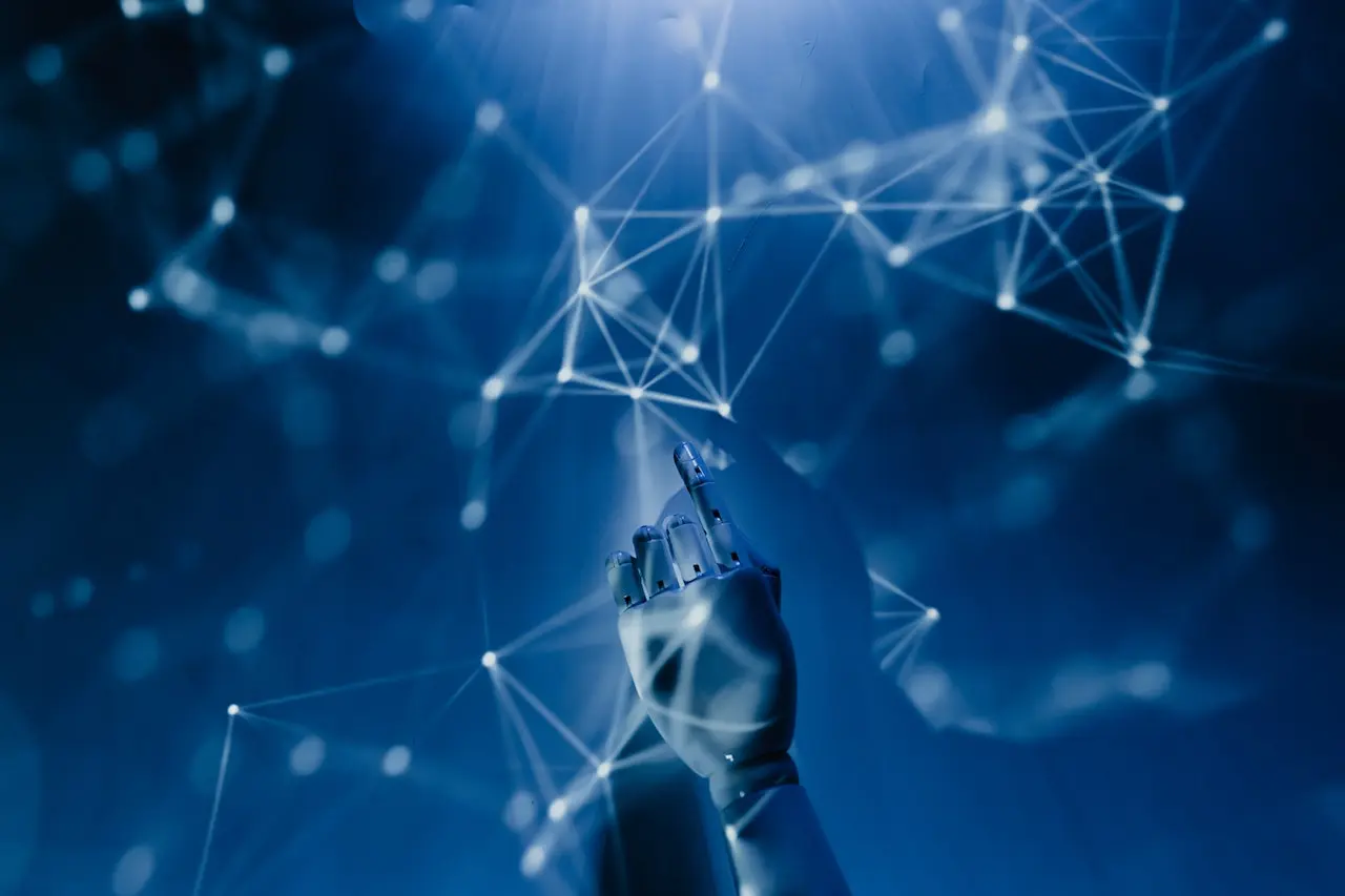 Robotic hand reaching toward a glowing network of connected data points