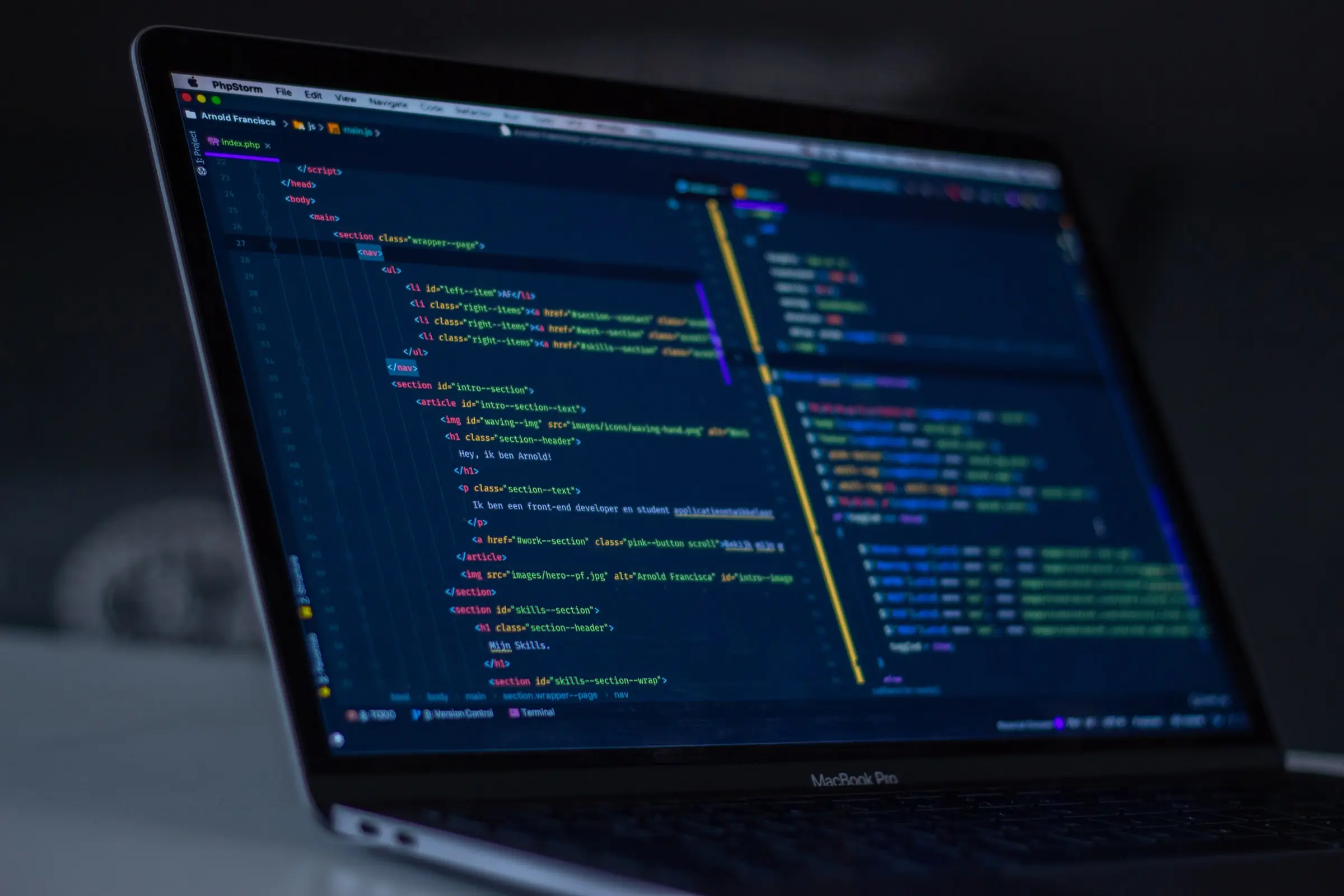 Laptop screen showing lines of code, representing custom AI/ML development