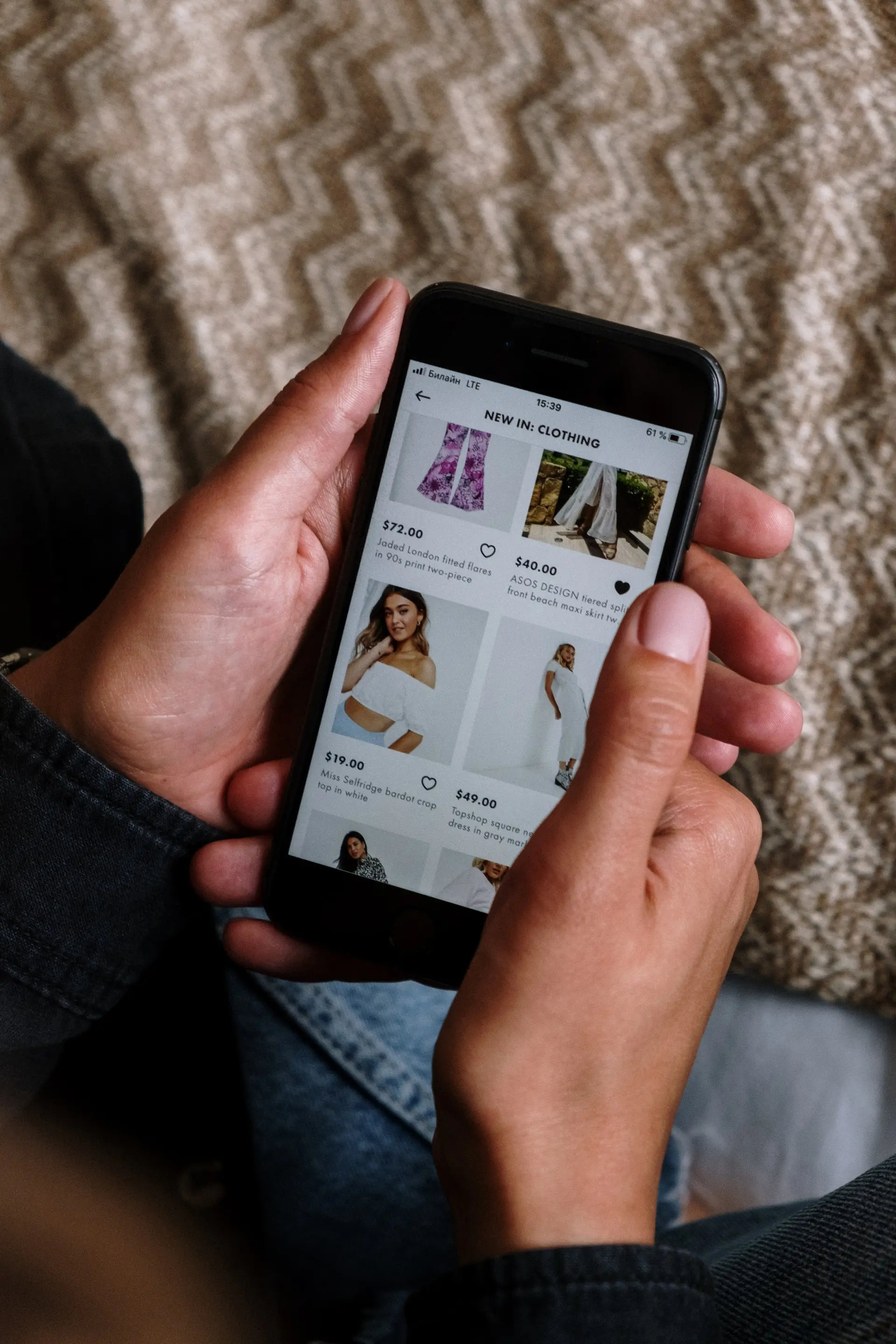 Women shoopping clothes on smartphone